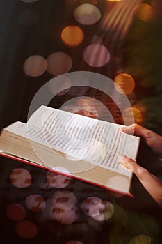 Girl reads a book - bokeh effect