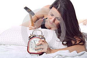 Girl ready to break the alarm clock