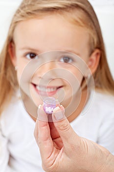 Girl receiving homeopathic medication