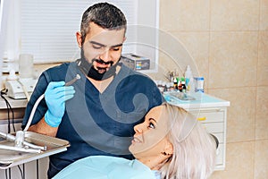 A girl at the reception  dentist in a dental chair