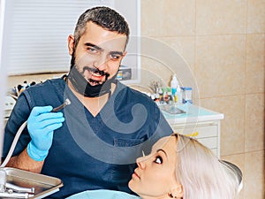 A girl at the reception  dentist in a dental chair