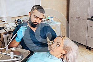 A girl at the reception  dentist in a dental chair