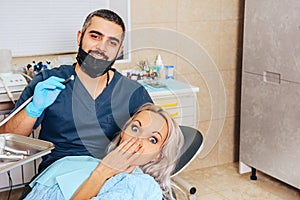 A girl at the reception  dentist in a dental chair