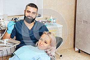 A girl at the reception  dentist in a dental chair