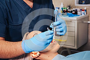 A girl at the reception  dentist in a dental chair