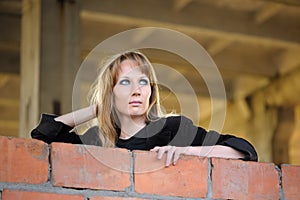 Girl recline on wall photo