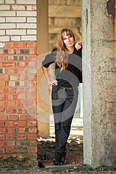 Girl recline on wall