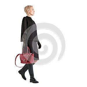 Girl with red bag and high boots