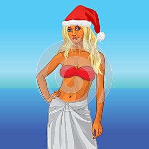 Girl in a red bikini and a santa hat on the beach