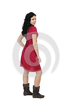 Girl in red dress smiling isolated
