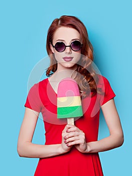 Girl in red dress with toy ice-cream