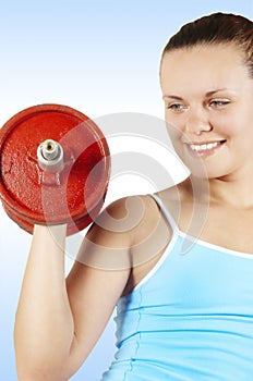 Girl and red dumbbell