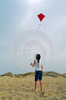 Girl and red kite