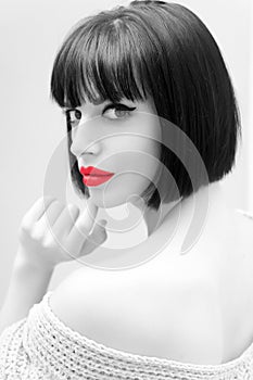 Girl with red lips on grey background in paris, france