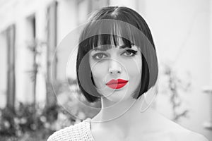 Girl with red lips on sensual face in paris, france photo