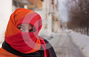 Girl in red purdah