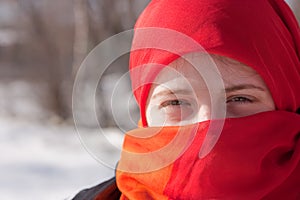 Girl in red purdah