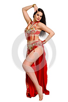Girl in a red suit oriental dance
