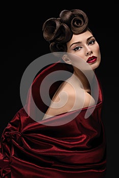 Girl in red texturized fabric