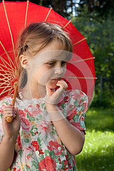 Girl with red umbrella