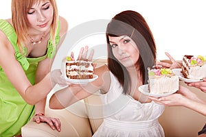 Girl refuse to eat cake. photo