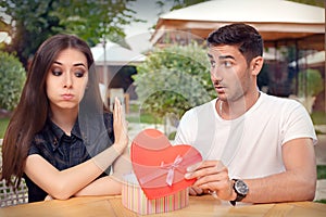 Girl Refusing Heart Shaped Gift From Her Boyfriend