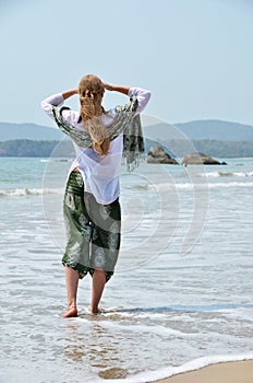 Girl relaxing on Agonda beach of South Goa, India