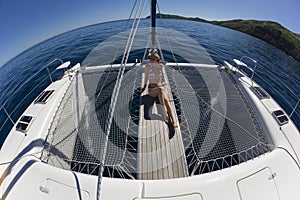 Girl relaxing on a catamaran - South Pacific