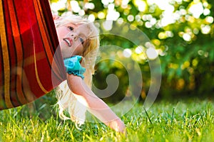 Girl relaxing in a hammock