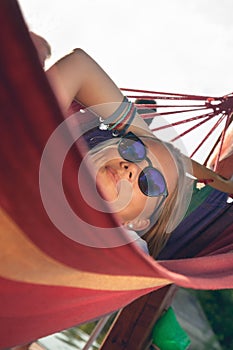 Girl Relaxing In Hammock