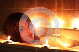 Girl relaxing in her bathtub