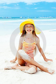 Girl relaxing on the island beach