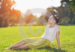 Girl relaxing on meadow