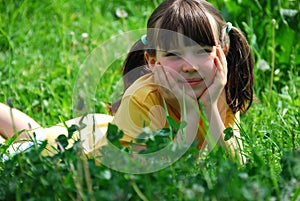 Girl relaxing in meadow