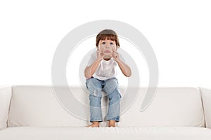 Girl relaxing on settee