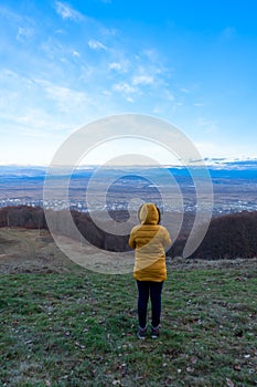 Girl relaxing on sunset view