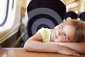 Girl Relaxing On Train Journey