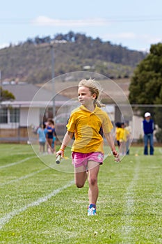 Girl in relay race