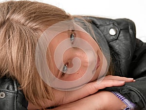 Girl resting head on hands