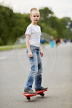 Girl rides two-wheeled skateboard on photo