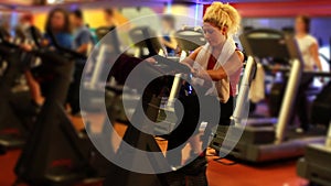 girl riding bicycle in a gym