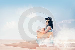 Girl riding fast to her future - education and motivation concept