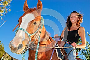 Girl riding on a horse