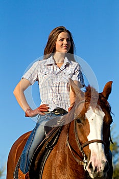 Girl riding a horse