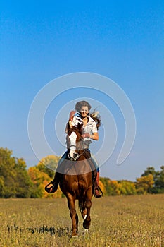 Girl riding a horse