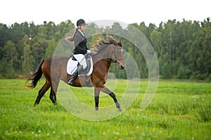 Girl riding horse