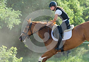 Girl riding a horse