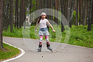 Girl riding rollerblades photo