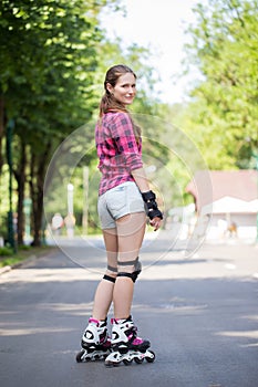 Girl riding rollerblades