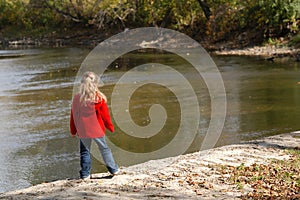 Girl On A Riverbank photo